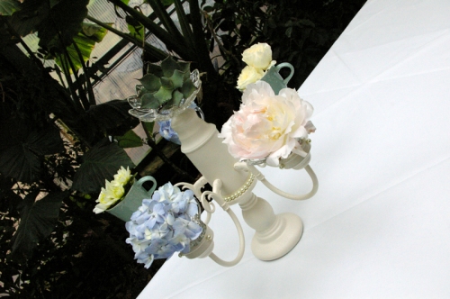 alice in wonderland themed wedding centerpiece tea cup candleabra utah 