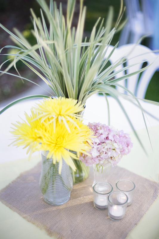 the centerpieces simple and stunning groupings in various glass vessels
