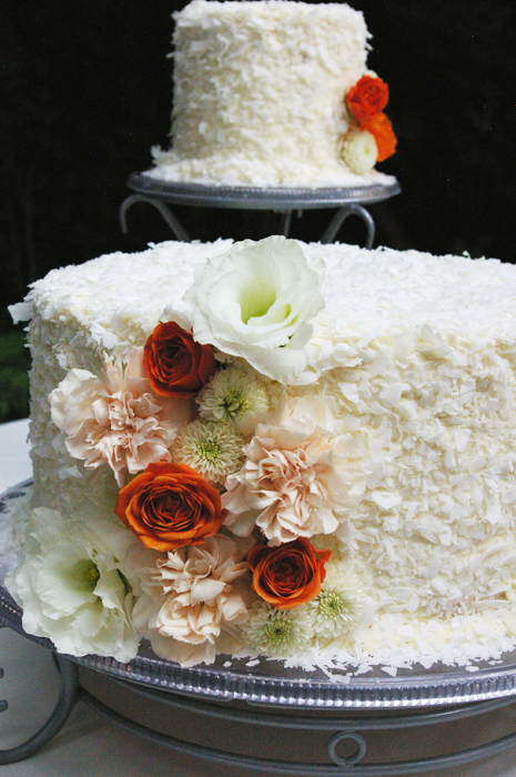 fresh flowers on coconut wedding cake studio stems