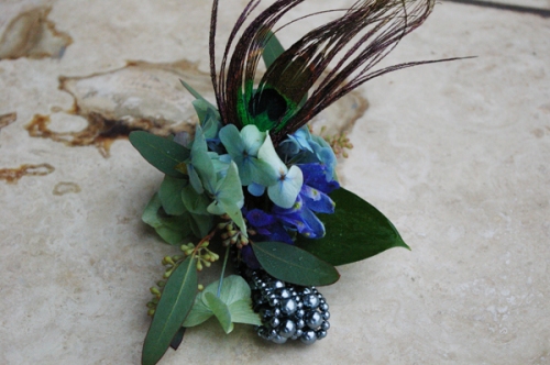 peacock feather wrist corsage wedding flowers studio stems